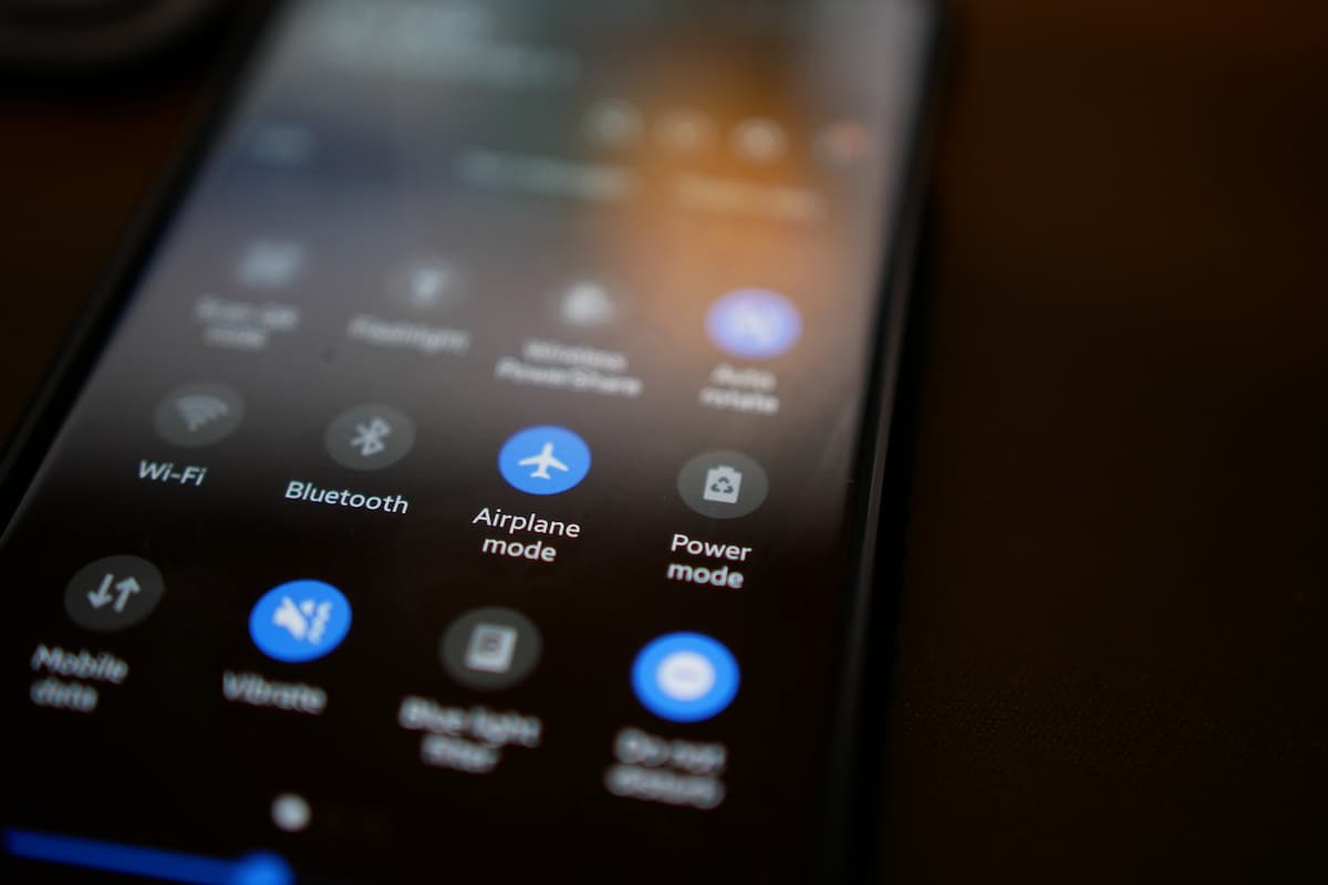 Close-up shot of a phone's screen with its Airplane Mode on. 