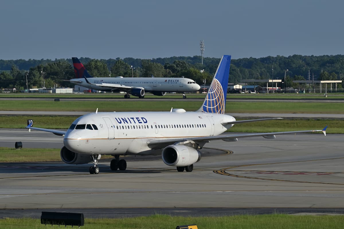 Delta Air Lines and United Airlines on the runway. 