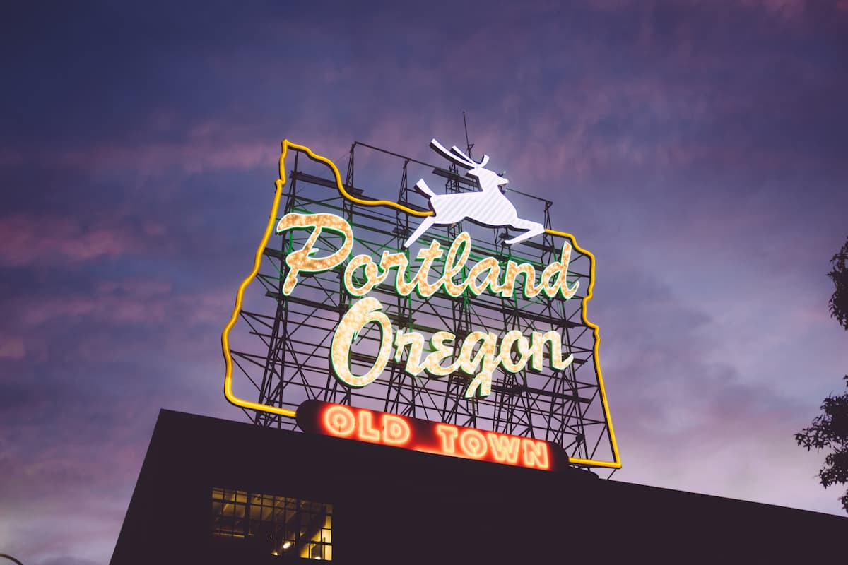 A neon signage that reads. "Portland Oregon OLD TOWN"